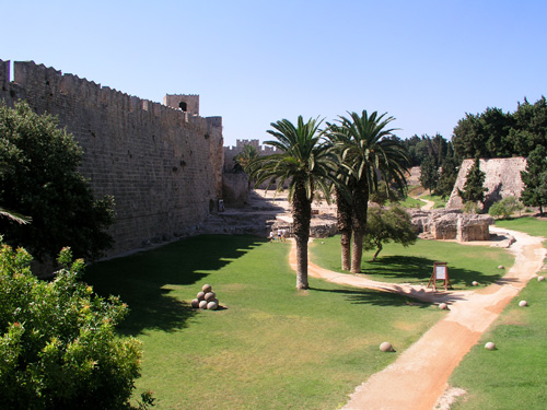 053-073004-11-Moat area between walls decorated with cannon balls, Rhodes